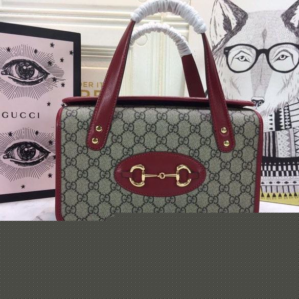 G*u*i top handle bags